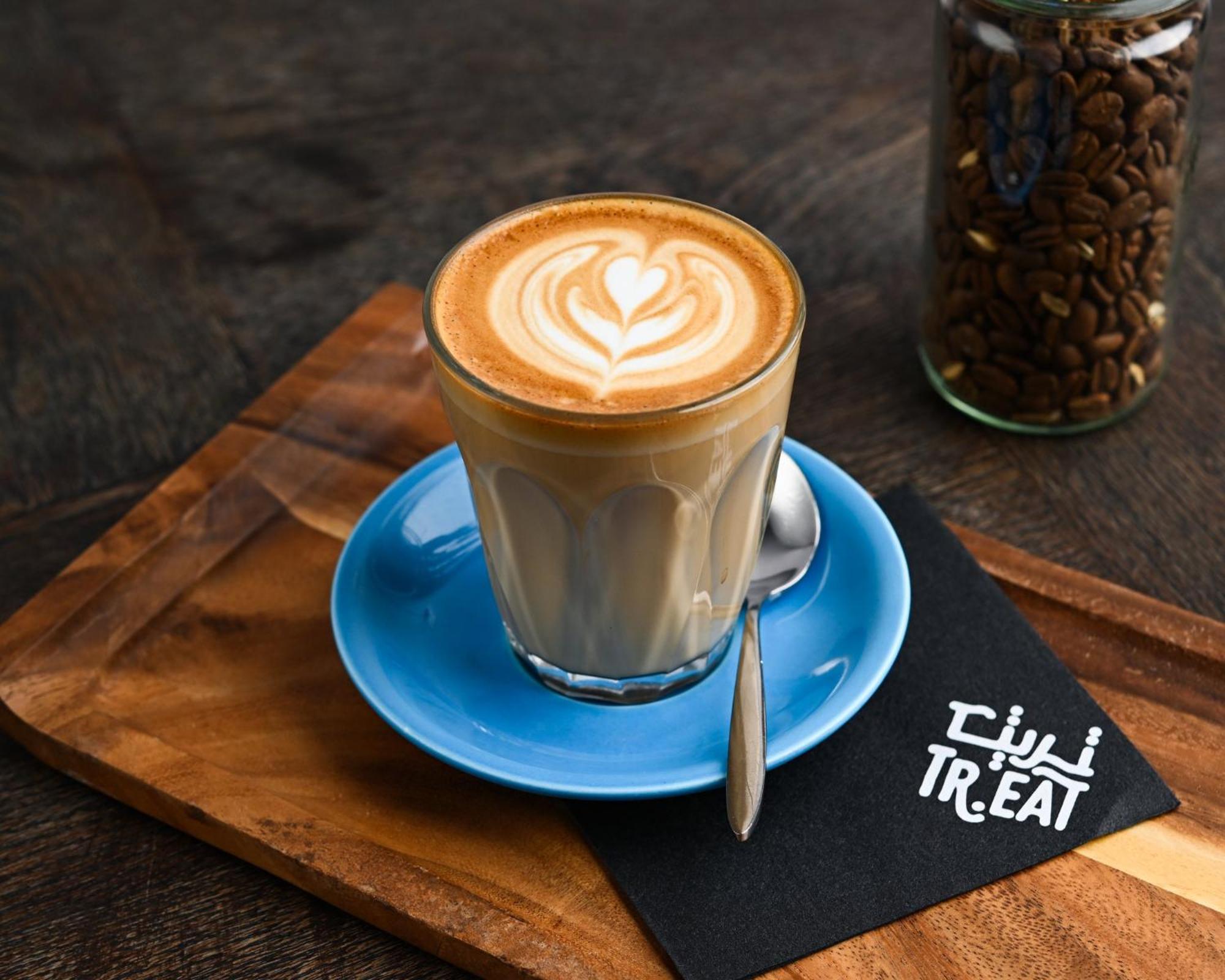 Intercontinental Muscat By Ihg Hotel Bagian luar foto A latte